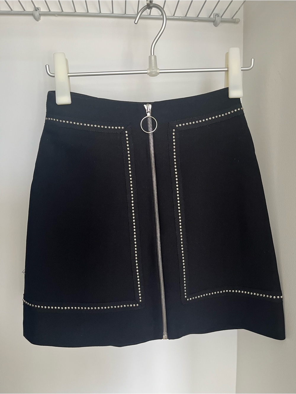 Maje Black Mini Skirt with Front Zip and Stud Trim